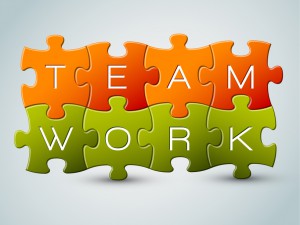 Vector puzzle teamwork illustration - orange and green